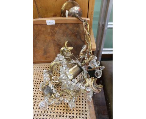 Glass and brass chandelier light fitting