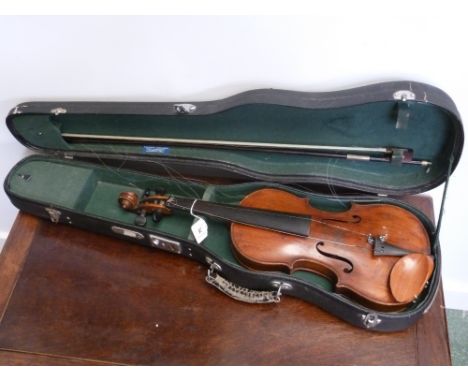 A violin, the two-piece back 33.5cm long excluding button, paper Stradivarius label, ebony tuning pegs, 56cm long overall, ea