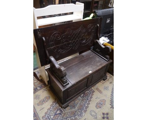 A mid 20th century monks bench; a candle box (2)
