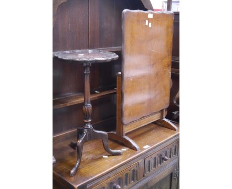 A reproduction wine table, dished circular top, scalloped edge with bead and dash border tripod base; a tilt top occasional t