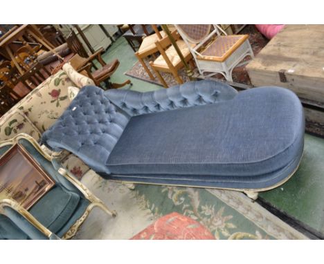 A Rococo revival deep button scroll end chaise.