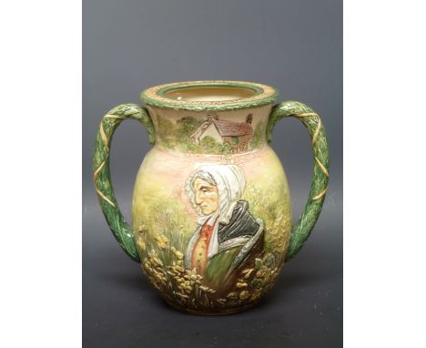 Charles J. Noke for Royal Doulton, a William Wordsworth commemorative loving cup, issued 1933, modelled in low relief with po