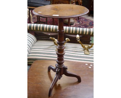 An early Victorian walnut tripod occasional table