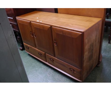 An Ercol blonde sideboard