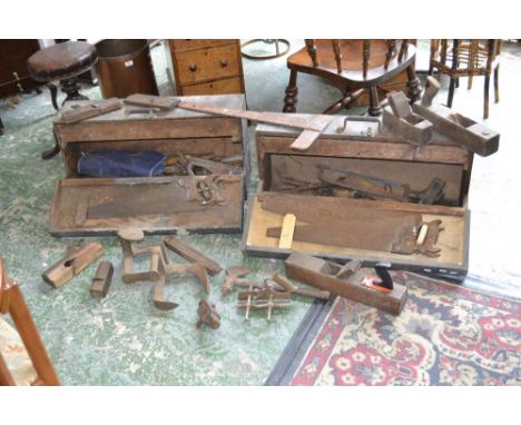 A mid 20th century carpenter's tool chest, containing tools; another chest containing tools; early - mid 20th century planes,