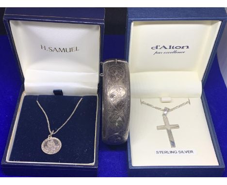 TWO SILVER NECKLACES IN PRESENTATION BOXES TO INCLUDE A ST CHRISTOPHER AND A CROSS WITH A  HALLMARKED BIRMINGHAM BANGLE 