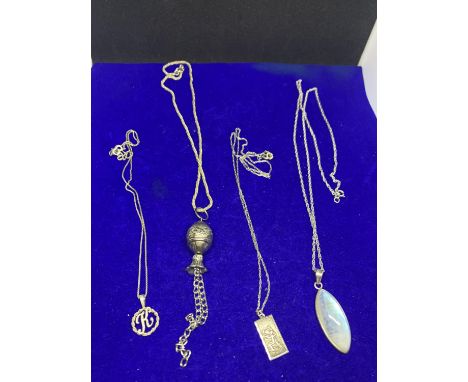 FOUR ASSORTED SILVER NECKLACES WITH PENDANTS TO INCLUDE A ST CHRISTOPHER, K ETC 