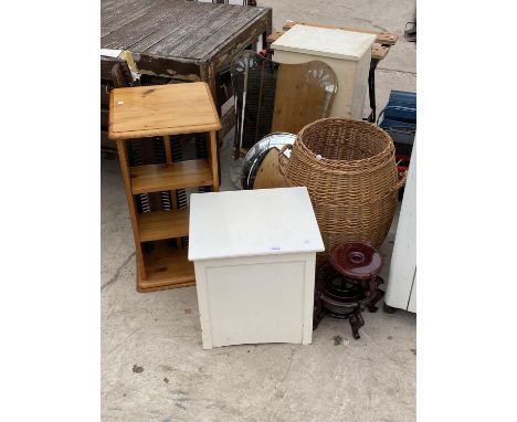 AN ASSORTMENT OF ITEMS TO INCLUDE A REVOLVING SHELF UNIT, WHICKER BASKET AND TWO MIRRORS ETC 