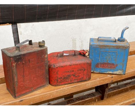 THREE VINTAGE PETROL CANS TO INCLUDE AN ESSO BLUE PARAFFIN CAN ETC 
