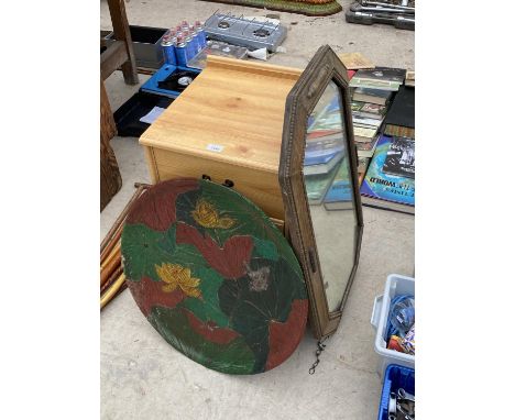 A WOODEN BED SIDE CABINET, A MIRROR AND A DECORATIVE CHARGER 