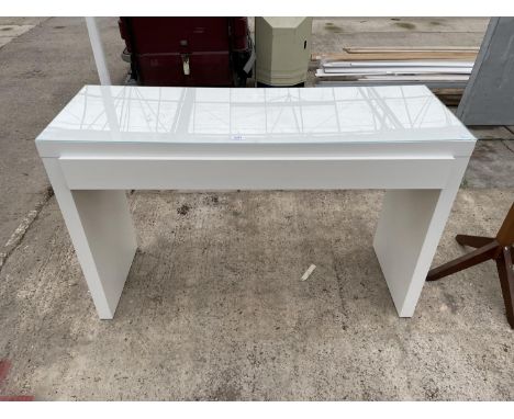 A MODERN WHITE CONSOLE TABLE 