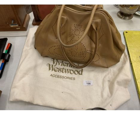 A VINTAGE VIVIEN WESTWOOD GENUINE LEATHER HANDBAG TO INCLUDE A STORAGE BAG 