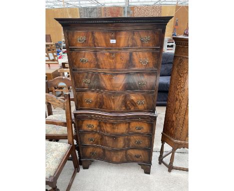 A REPRODUCTION SEVEN DRAWER CHEST ON CHEST WITH DRESSING SLIDE ON BRACKET FEET 31.5" WIDE 