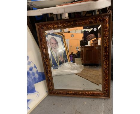 A WOODEN FRAMED WALL MIRROR TO INCLUDE AN INTEGRATED STAND AT THE REAR 