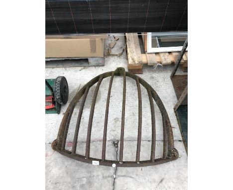 A VINTAGE CAST IRON HAY RACK 