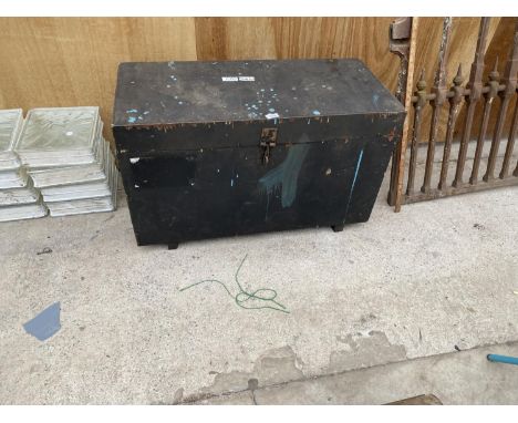 A VINTAGE WOODEN CHEST 