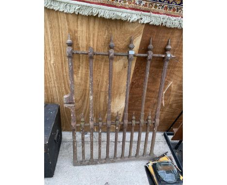 A VINTAGE WROUGHT IRON GATE 