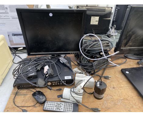 A CCTV CAMERA SYSTEM WITH THREE CAMERAS AND A MONITOR 