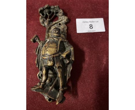 A SMALL BRASS DOOR KNOCKER IN THE FORM OF FALSTAFF 