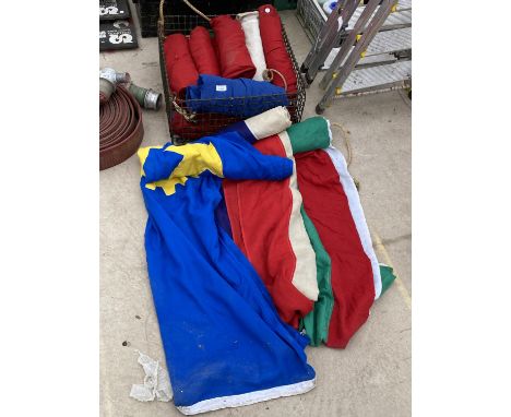 A LARGE ASSORTMENT OF VINTAGE FLAGS 