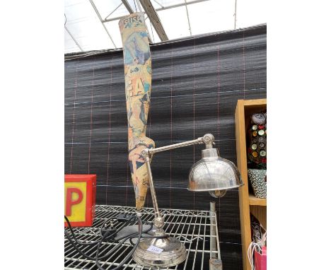 A SILVER METAL ANGLEPOISE STYLE DESK LAMP AND AN DECORATIVE LEG 