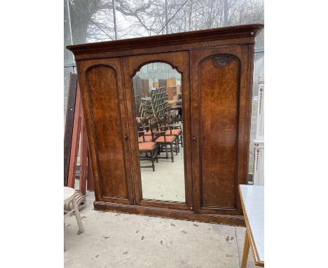 A VICTORIAN WALNUT TRIPLE WARDROBE WITH CENTRAL MIRROR DOOR, 83" WIDE 