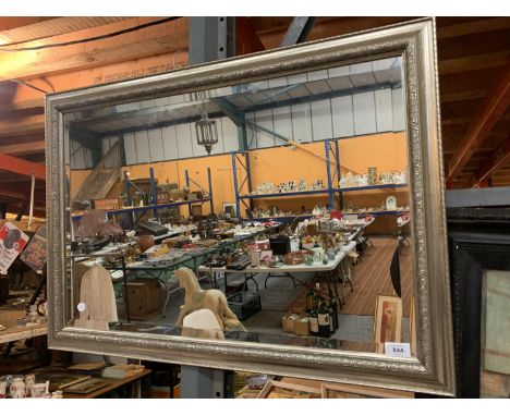 A GILT FRAMED RECTANGULAR BEVEL EDGED WALL MIRROR 