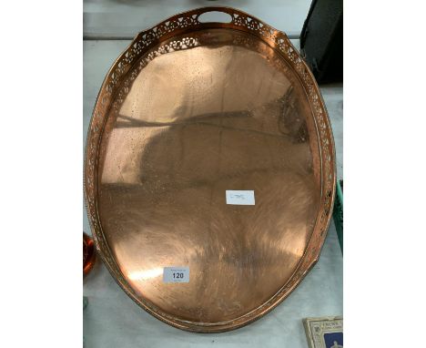 A LARGE OVAL VINTAGE COPPER TRAY - WIDTH 61CMS 