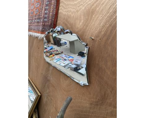 A VINTAGE ART DECO BEVELED EDGED MIRROR 