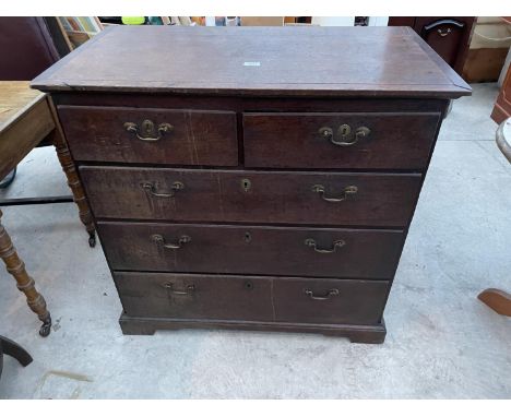 A GEORGE III OAK CHEST OF TWO SHORT AND THREE LONG DRAWERS ON BRACKET FEET, 38" WIDE 