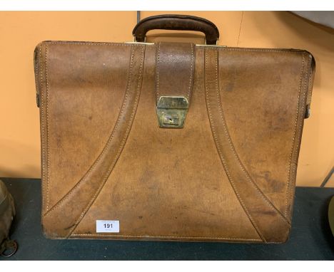 A VINTAGE LEATHER BRIEFCASE 
