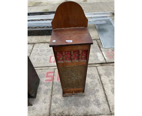 A CONTINTENTAL FRENCH BREAD STICK CABINET WITH EMBOSSED BRASS DOOR 