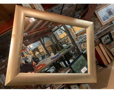 A MODERN PAINTED FRAMED MIRROR 