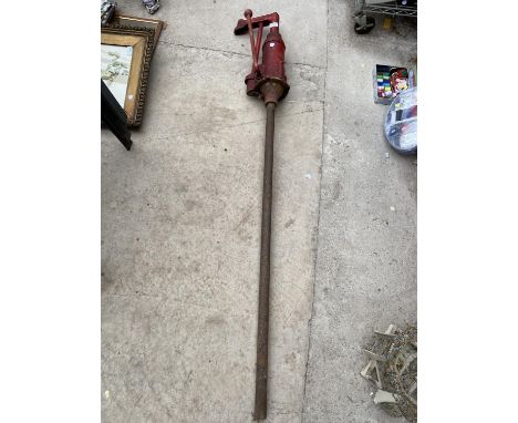 A VINTAGE METAL MANUAL OIL PUMP 