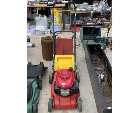 A PETROL LAWN MOWER WITH HONDA ENGINE AND A WOLF GARTEN GRASS BOX 