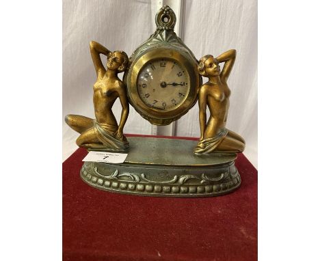 AN ART DECO STYLE MANTLE CLOCK FEATURING TWO NUDES - HEIGHT 18CMS 