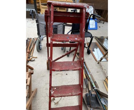 A SET OF VINTAGE G A JONES WOODEN STEP LADDERS 