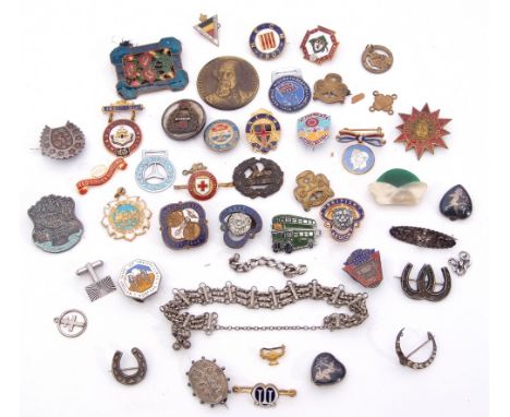 Mixed Lot: to include five Victorian silver badges, two silver and enamel badges together with a quantity of metal enamel bad