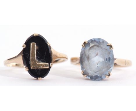 Mixed Lot: modern 9ct gold and faceted blue stone dress ring, together with a 9ct stamped ring with an oval onyx panel applie