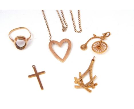 Mixed Lot: 9ct gold penny farthing charm, a 9ct textured pendant, a 9ct cross pendant, a broken open work pendant necklace, t