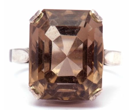 Modern stepped cut quartz dress ring raised in a pierced box white metal mount, size M