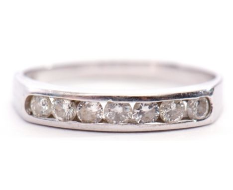 18ct white gold diamond set half eternity ring, channel set with 7 round brilliant cut diamonds, 0.49ct approx, to a flat tap