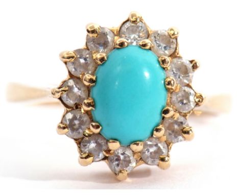 Modern turquoise and paste set cluster ring, the oval shaped cabochon turquoise within a surround of small pastes, stamped 18