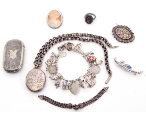 Mixed Lot: Victorian oval silver locket, foliate engraved, Birmingham 1884, on a large circular linked white metal chain, a w
