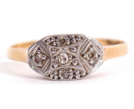 Precious metal diamond cluster ring, the shaped oval plaque set with five small single cut diamonds, each individually claw s