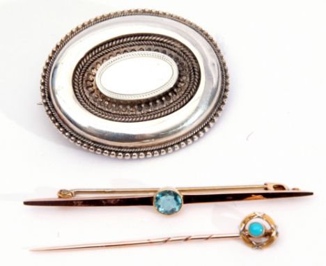 15c stamped tie pin, the finial set with a cabochon turquoise, a 9ct stamped bar brooch with central faceted circular blue st