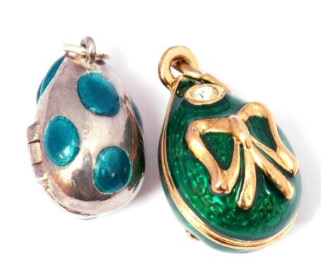 Two modern egg pendants each with translucent enamel decoration (2)