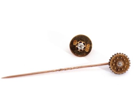 Victorian cased stick pin, the Etruscan finial centring a diamond, together with an 18ct stamped screw in finial, diamond set