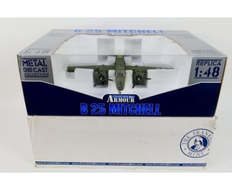 Franklin Mint - Armour Collection. A boxed 1:48 scale Franklin Mint Armour Collection diecast B25 Mitchell airplane (98183).A