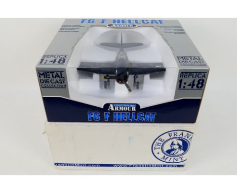 Franklin Mint. A boxed Franklin Mint #B11B567 98320 F6F5 Hellcat-USN-VF27 Kangaroos. Item appears in Mint condition with Exce